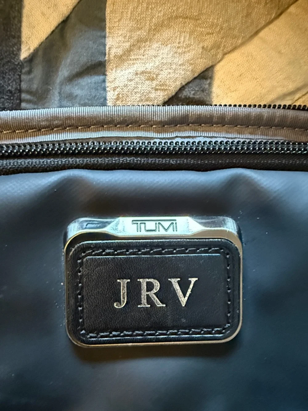 Tumi Black Travel Organizer with Metal and Leather Monogram Plate.